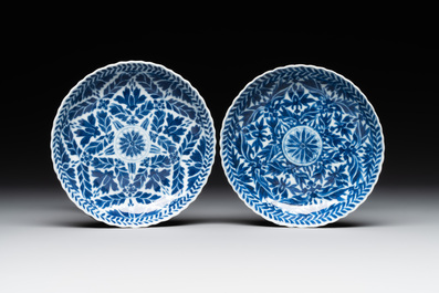 Five fine Chinese blue and white cups and saucers, 19th C.