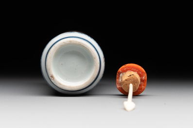 A Chinese blue, white and copper-red 'dragon' snuff bottle, 19th C.