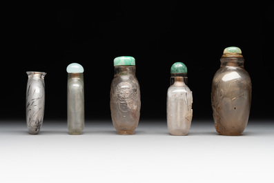 Five Chinese rock crystal and needle agate snuff bottles, Qing