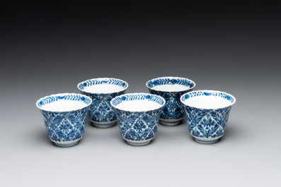 Five fine Chinese blue and white cups and saucers, 19th C.