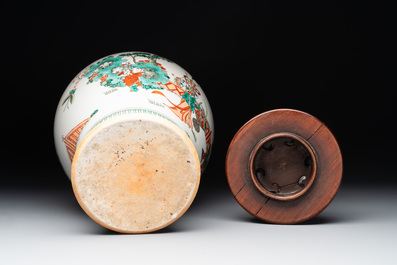 A Chinese famille rose coral-red-ground vase and a famille verte vase, 19th C.