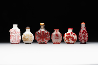 A group of six Chinese overlay glass snuff bottles, 19th C.