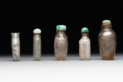 Five Chinese rock crystal and needle agate snuff bottles, Qing
