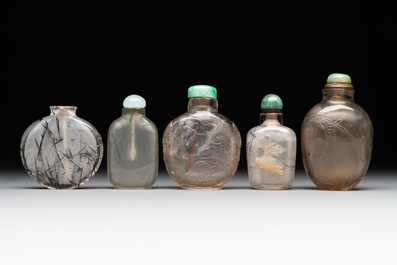 Five Chinese rock crystal and needle agate snuff bottles, Qing