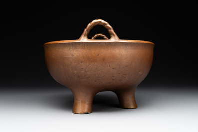 A large Chinese bronze tripod censer with two handles, 19th C.