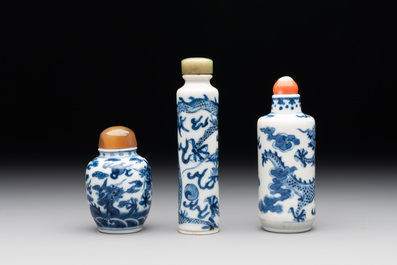 Three Chinese blue and white 'dragon' snuff bottles, 19th C.