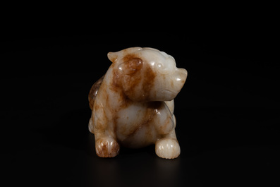 A large Chinese white and russet jade sculpture of a mythical beast, 17/18th C.