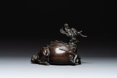 A fine Chinese bronze 'qilin' censer and cover, Ming