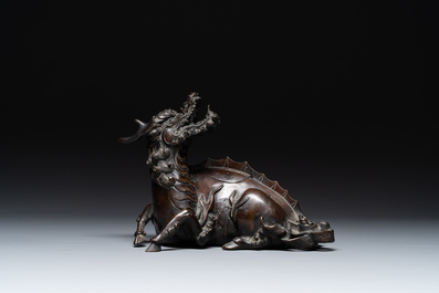 A fine Chinese bronze 'qilin' censer and cover, Ming