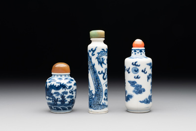 Three Chinese blue and white 'dragon' snuff bottles, 19th C.