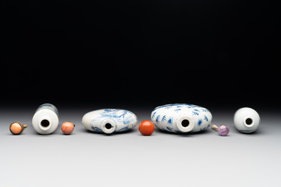 Three Chinese blue, white and copper-red snuff bottles and a blue and white snuff bottle, Qianlong mark, 19th C.
