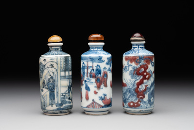 Three Chinese blue, white and copper-red snuff bottles, 19th C.