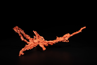 A Chinese red coral group of birds among flowering branches, 19/20th C.