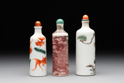 A Chinese copper-red 'dragon' snuff bottle and two famille verte snuff bottles, Gu Yue Xuan 古月軒 and Daoguang mark, 19th C.
