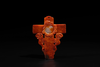 A Chinese white and red jade 'crucifix' pendant, 19th C.