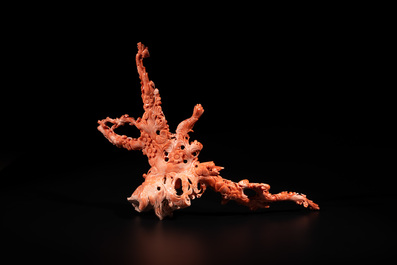 A Chinese red coral group of birds among flowering branches, 19/20th C.