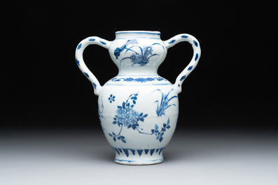 A Chinese blue and white vase with floral design and two handles, Transitional period