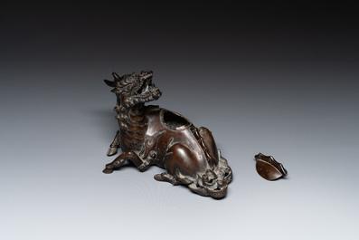 A fine Chinese bronze 'qilin' censer and cover, Ming