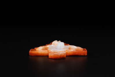 A Chinese white and red jade 'crucifix' pendant, 19th C.