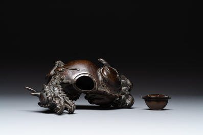 A fine Chinese bronze 'qilin' censer and cover, Ming