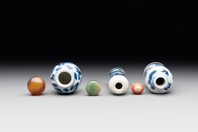 Three Chinese blue and white 'dragon' snuff bottles, 19th C.
