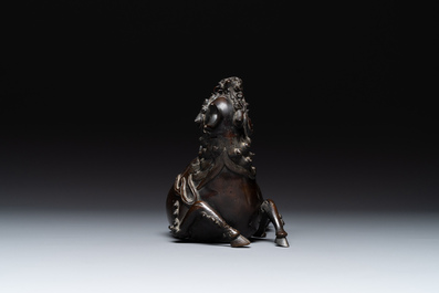 A fine Chinese bronze 'qilin' censer and cover, Ming