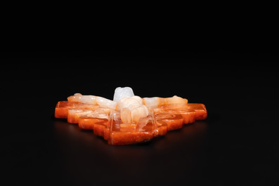 A Chinese white and red jade 'crucifix' pendant, 19th C.