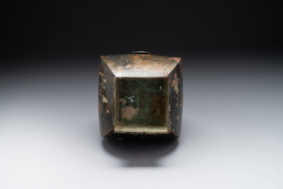A Chinese archaic bronze vase with 'Taotie' handles, 'fang hu 方壺', Han