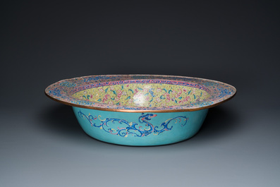 An exceptionally large Chinese Canton enamel basin with floral design, Yongzheng