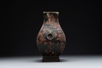 A Chinese archaic bronze vase with 'Taotie' handles, 'fang hu 方壺', Han