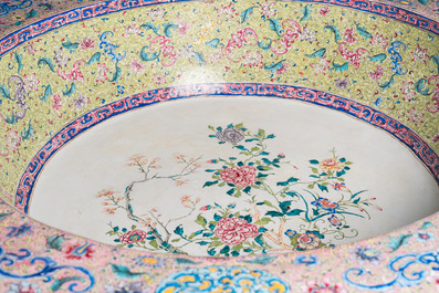 An exceptionally large Chinese Canton enamel basin with floral design, Yongzheng