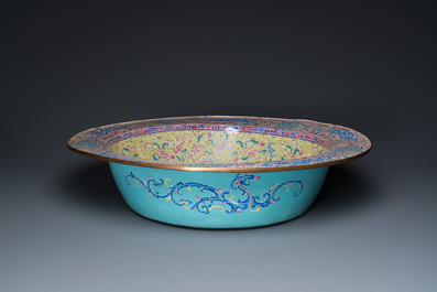 An exceptionally large Chinese Canton enamel basin with floral design, Yongzheng