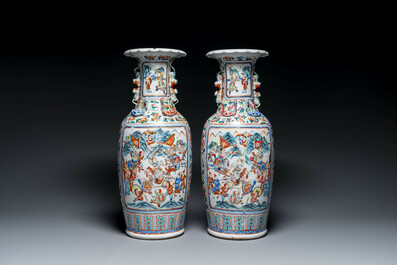 A pair of Chinese famille rose vases with narrative design, 19th C.
