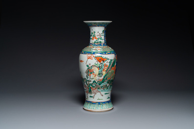 A Chinese famille verte vase with warriors on horseback, 19th C.