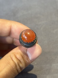 A Chinese blue, white and copper-red snuff bottle with a dragon, dragon mark, 19th C.