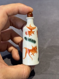 A Chinese copper-red 'dragon' snuff bottle and two famille verte snuff bottles, Gu Yue Xuan 古月軒 and Daoguang mark, 19th C.