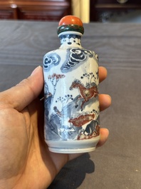 A Chinese blue, white and copper-red snuff bottle with the zodiac and a copper-red 'dragon' snuff bottle, 18/19th C.
