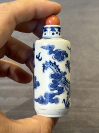 Three Chinese blue and white 'dragon' snuff bottles, 19th C.