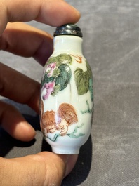 Three Chinese famille rose and iron-red 'Buddhist lion' and 'dragon' snuff bottles, 19th C.