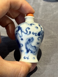 Six Chinese blue and white snuff bottles, 19th C.