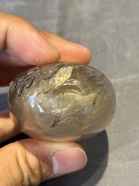 Five Chinese rock crystal and needle agate snuff bottles, Qing