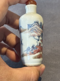 A Chinese blue, white and copper-red 'landscape' snuff bottle, 19th C.