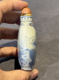 Three Chinese blue, white and copper-red snuff bottles and a blue and white snuff bottle, Qianlong mark, 19th C.