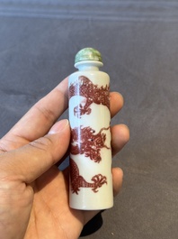 A Chinese blue, white and copper-red snuff bottle with the zodiac and a copper-red 'dragon' snuff bottle, 18/19th C.