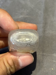 Five Chinese rock crystal and needle agate snuff bottles, Qing
