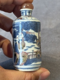 Five Chinese blue, white and copper-red snuff bottles, 19/20th C.