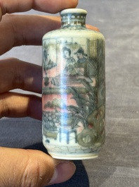 Four Chinese blue, white and copper-red snuff bottles and a blue and white snuff bottle, 19/20th C.