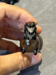 Six Chinese smoky quartz animal-form snuff bottles, 19th/20th C.