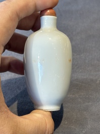 A fine Chinese iron-red and grisaille 'horse and man' snuff bottle, 19th C.