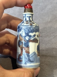 Five Chinese blue, white and copper-red snuff bottles, 19/20th C.